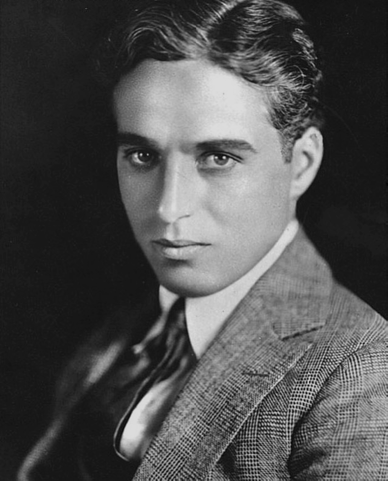 Чарли чаплин в молодости. Спенсер чаплин. Спенсер чаплин. Спенсер чаплин. Чарли чаплин в молодости.